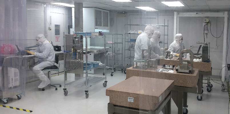 Lab workers in cleanroom Assembly Industrial